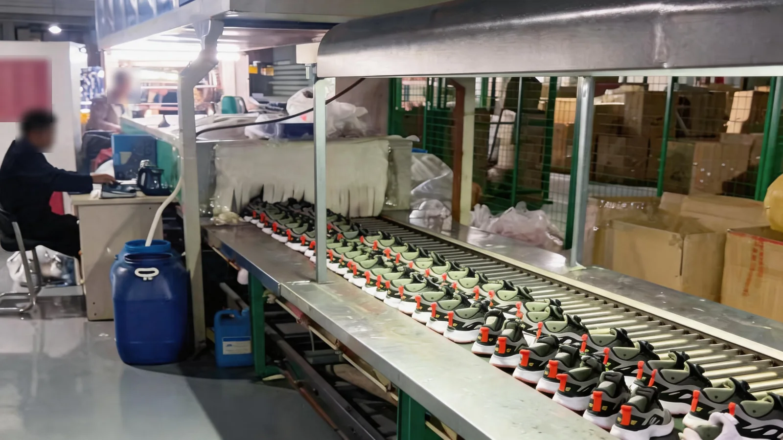 Kids sneaker assembly line with conveyor and heat-setting oven